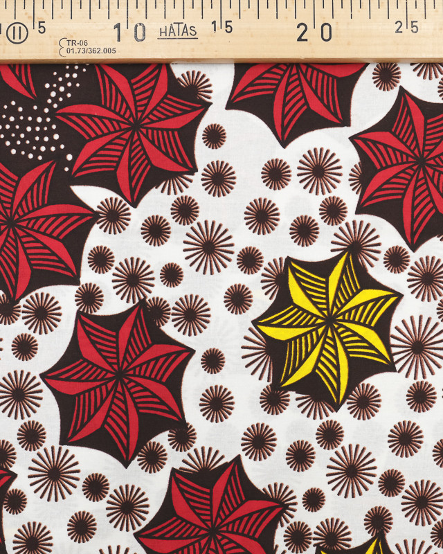 Tissu africain motif graphique étoile jaune rouge fond blanc - Mercerine