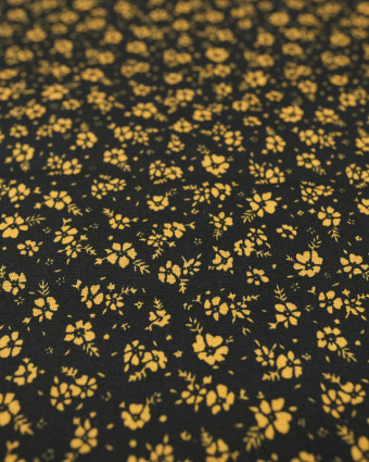 Popeline de coton imprimée fleur ocre fond noir - Mercerine
