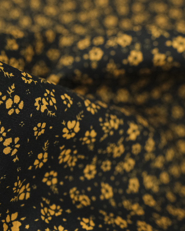 Popeline de coton imprimée fleur ocre fond noir - Mercerine