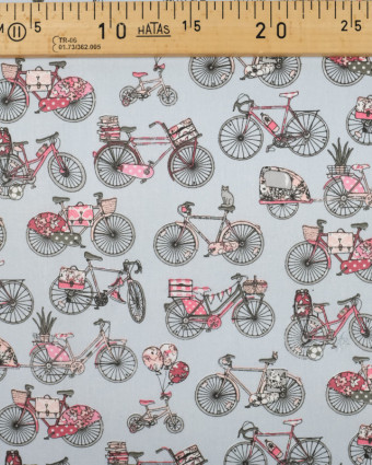 Coton imprimé au mètre : vélos roses sur un fond gris - Mercerine