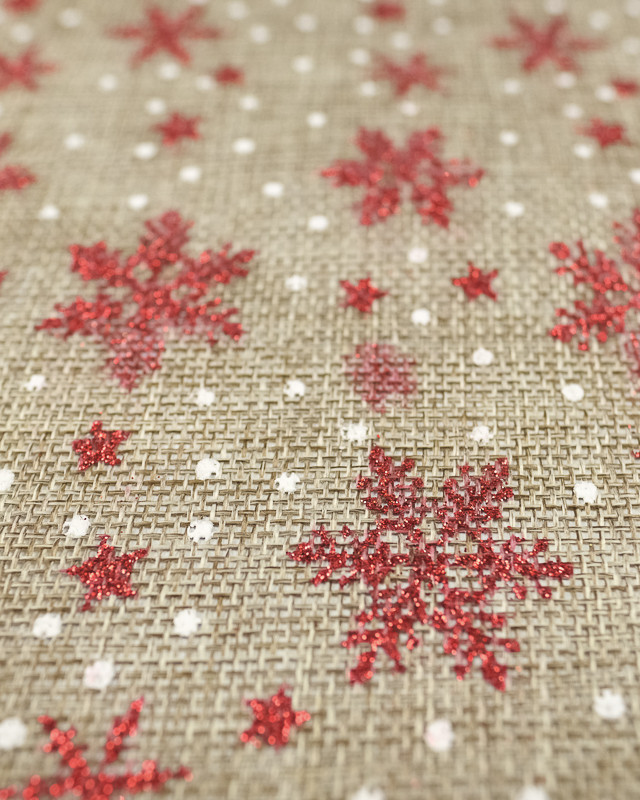 Tissu noel : toile de jute flocon rouge pailleté - Mercerine