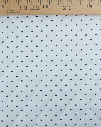 Tissu Piqué Matelassé Ancotex Blanc Motif Petit Cœur Bleu   - Mercerine