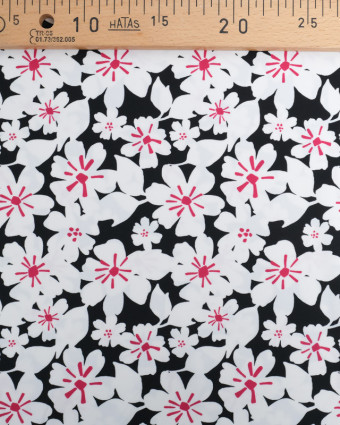 Tissu Lycra Jolie Fleur Blanche et Rose Fond Noir- Mercerine