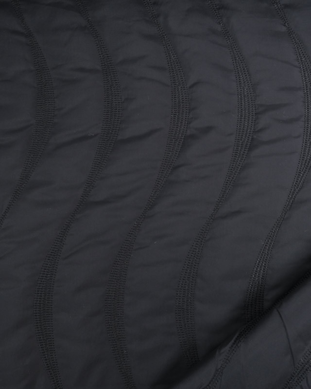 Tissu Matelassé Doudoune Noir lignes Wavy - Mercerine